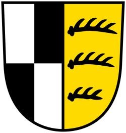 Wappen des Zollernalbkreises: in gespaltenem Schild das Silber und Schwarz gevierte Zollernschild sowie das württembergische Stammwappen mit den drei Hirschstangen