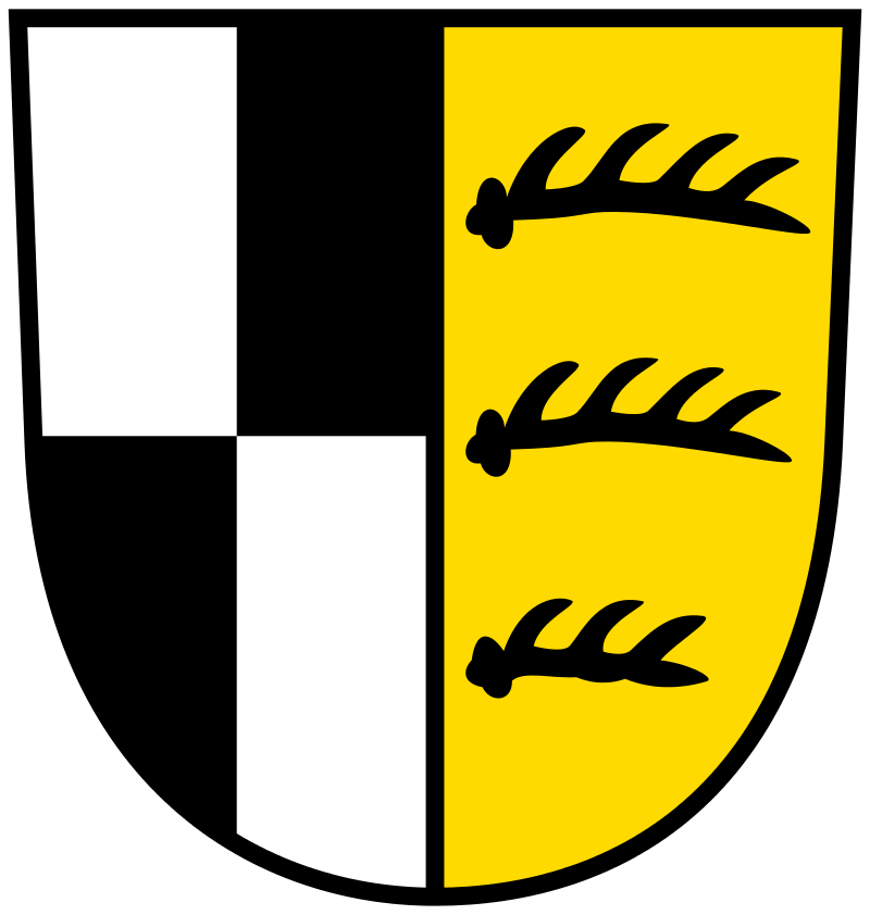 Wappen des Zollernalbkreises: in gespaltenem Schild das Silber und Schwarz gevierte Zollernschild sowie das württembergische Stammwappen mit den drei Hirschstangen